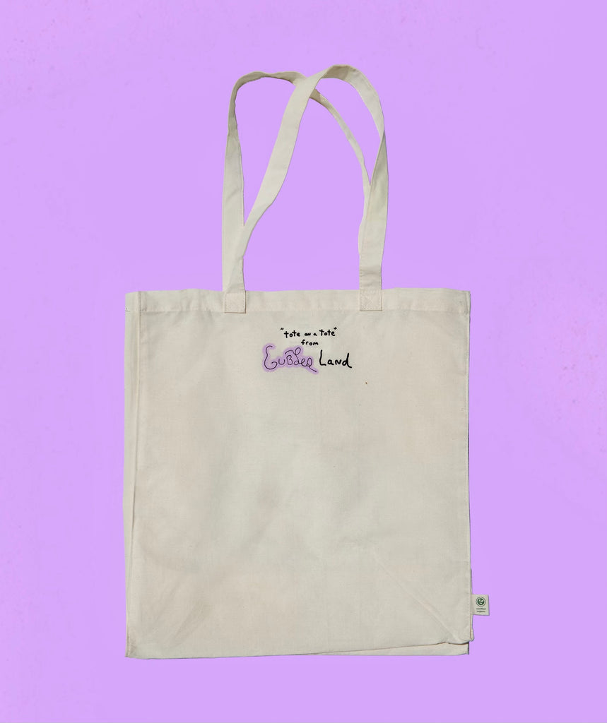Canvas tote bag with handwriting that says "Tote on a tote from Gublerland"