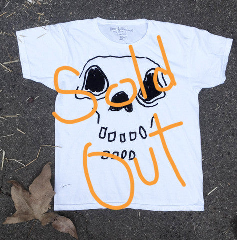 Hand-drawn skeleton on white t-shirt. Large hand-written text over image that says “Sold Out”.