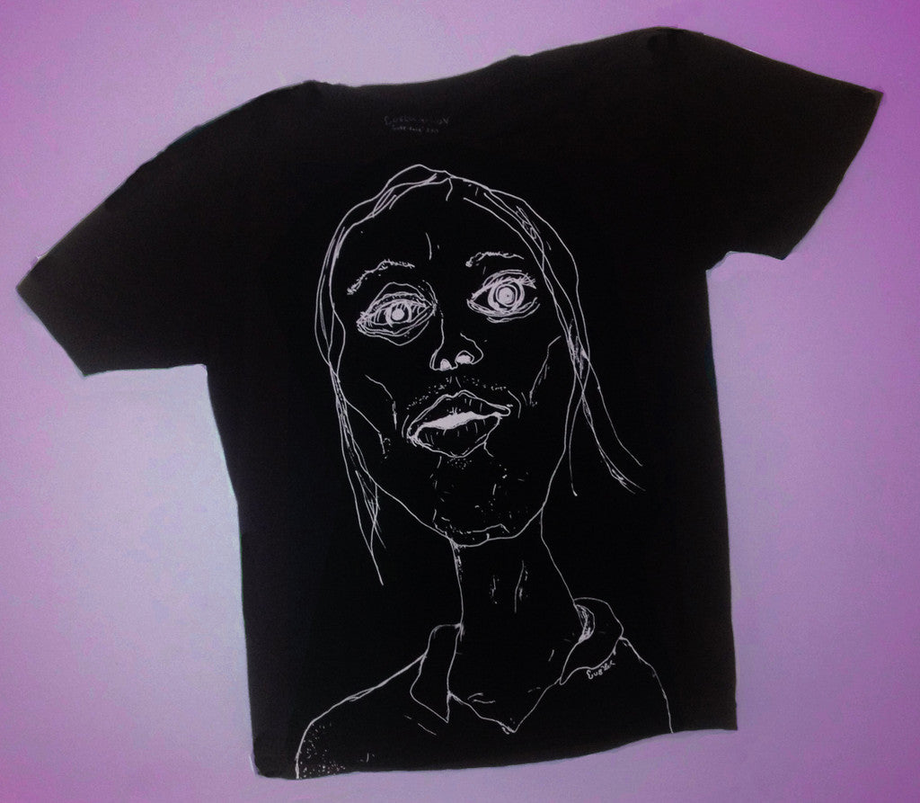 Black t-shirt with self portrait of Matthew on it.