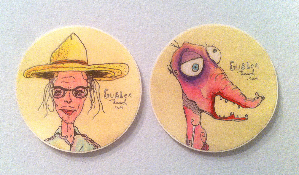 Picture of a pair of stickers side by side with Gubler paintings on them.